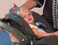 Child in rear-facing car seat